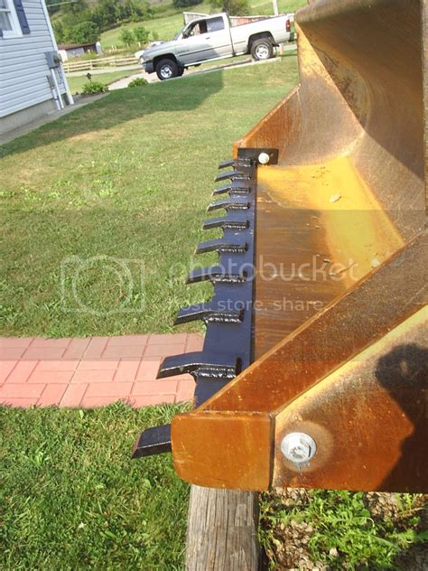 skid steer loader tooth bar|front end loader teeth bars.